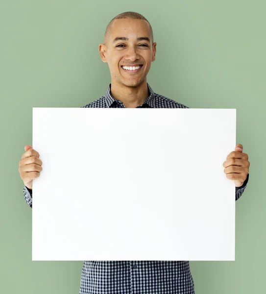 Man holding empty white placard — Stock Photo, Image