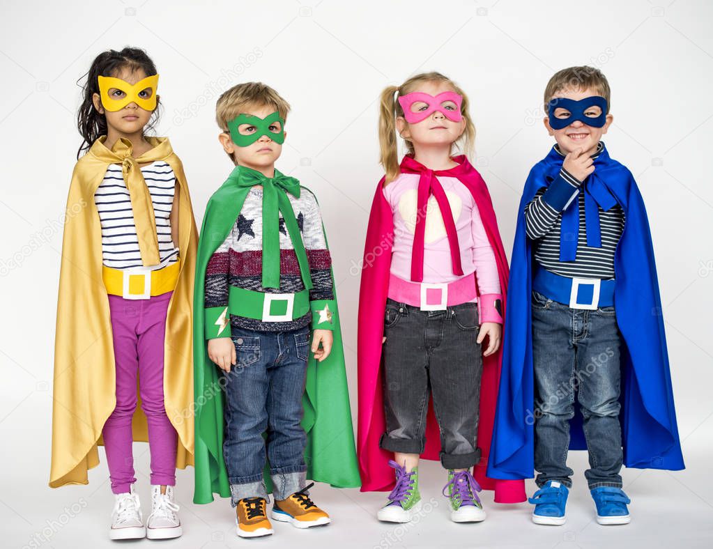 Kids in super heroe costumes