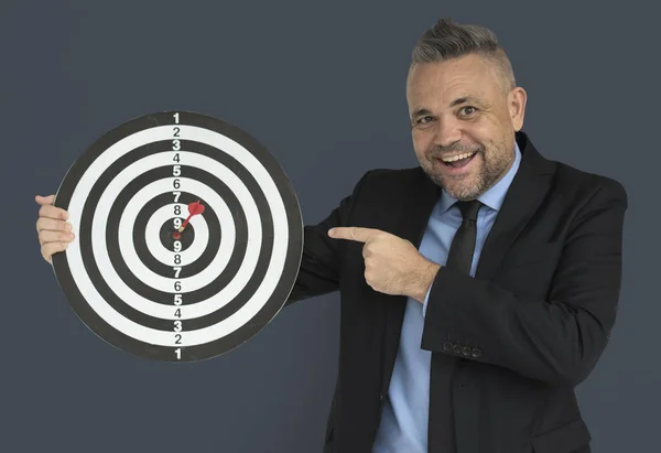 Homem com placa de dardo — Fotografia de Stock