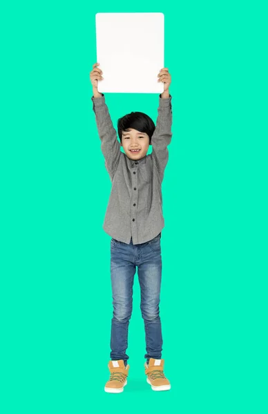 Boy holding blank board — Stock Photo, Image