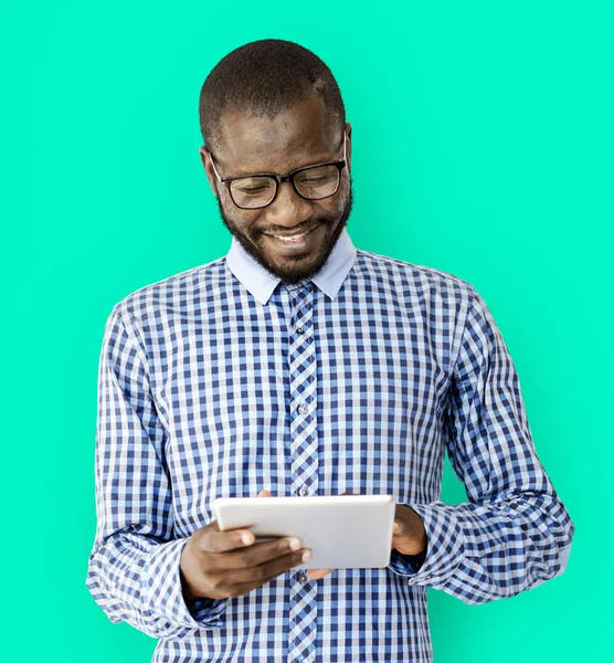 African man using digital tablet — Stock Photo, Image