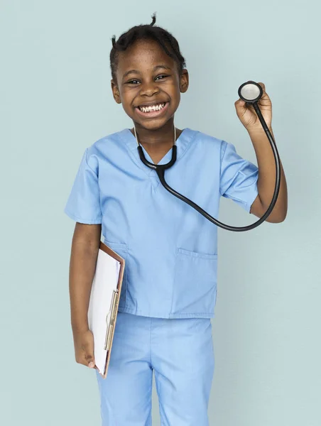 Flicka i läkare uniform — Stockfoto