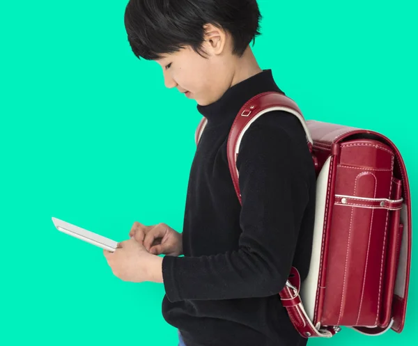Asiático criança com mochila — Fotografia de Stock