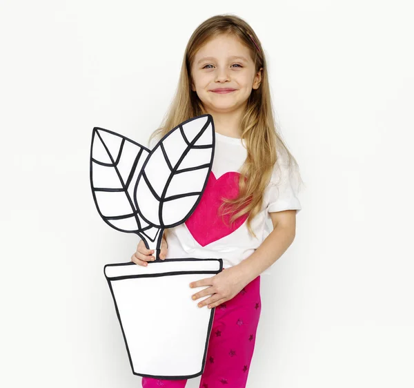 Chica sosteniendo planta de papelería — Foto de Stock