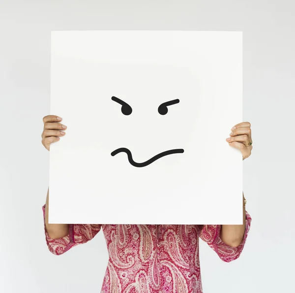 Persona cubriendo la cara con pancarta blanca —  Fotos de Stock