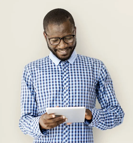 African man using digital tablet — Stock Photo, Image