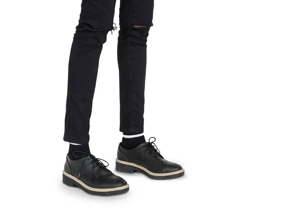 Mulher em jeans e sapatos pretos — Fotografia de Stock