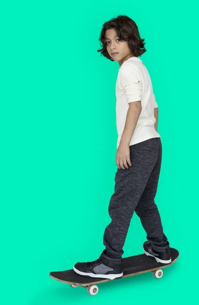 Little boy with skateboard — Stock Photo, Image