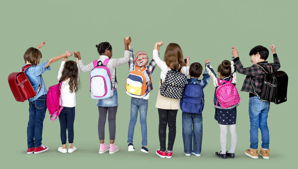 school children standing in a row 
