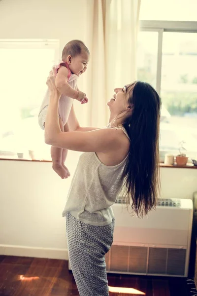 Mother holding newborn baby — Stock Photo, Image