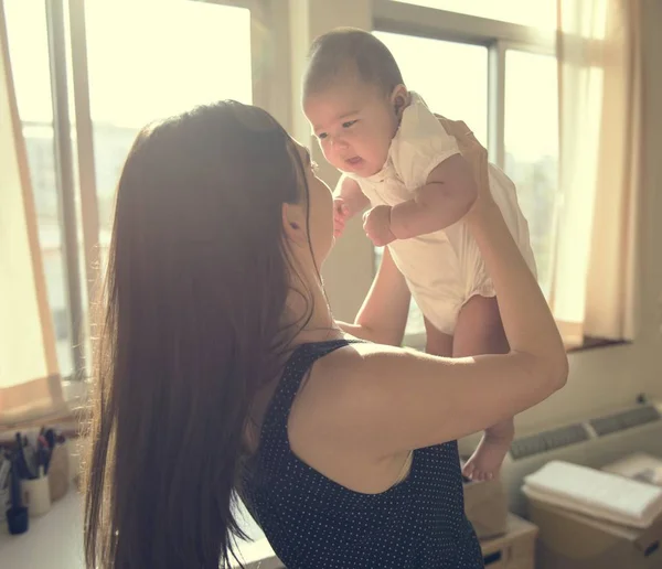 Mother holding newborn baby — Stock Photo, Image