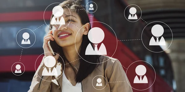 Businesswoman talking on smartphone — Stock Photo, Image