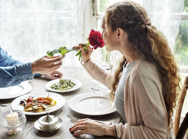 Man Giving Rose to Woman — Stock Photo, Image