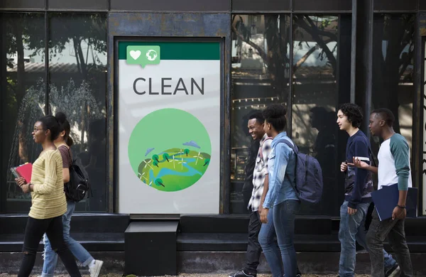 Students walking near placard — Stock Photo, Image