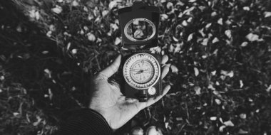 woman holding Compass 