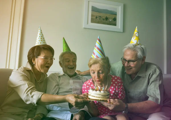 senior people celebrating birthday