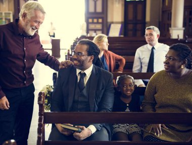 People praying in the Church clipart