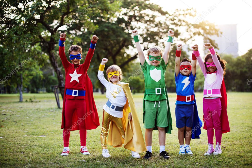 adorable children in Superhero costumes