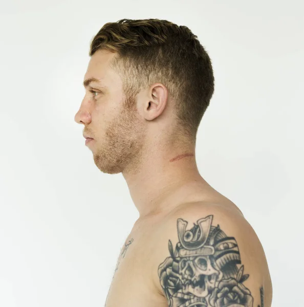 Shirtless tattooed man — Stockfoto