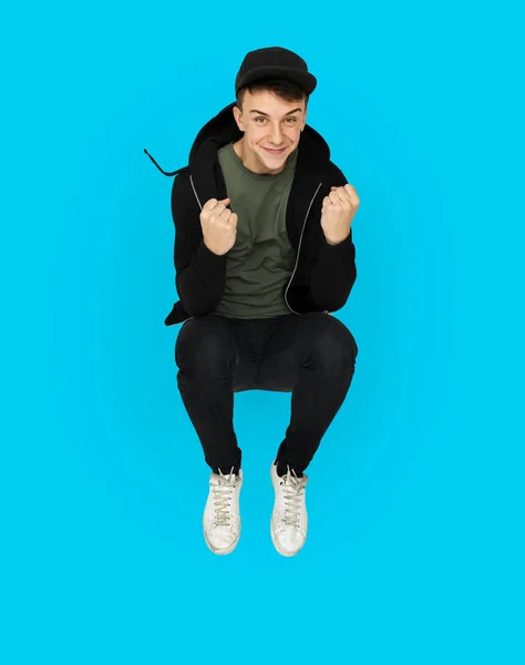 Boy jumping in the studio — Stock Photo, Image