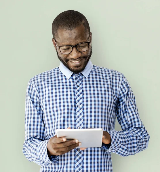 African man using digital tablet — Stock Photo, Image