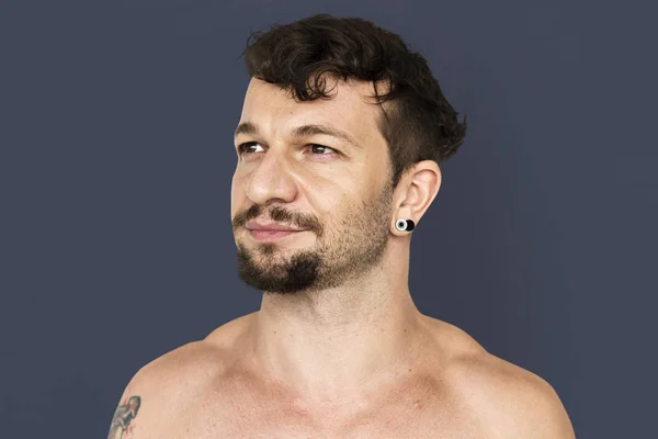 Giovane uomo con tatuaggio — Foto Stock