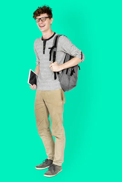 Man standing with backpack and tablet — Stock Photo, Image