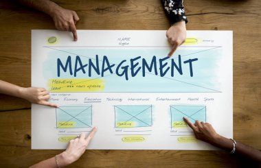 Afiş üzerinde çalışan eller 