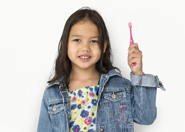 Chica con cepillo de dientes — Foto de Stock