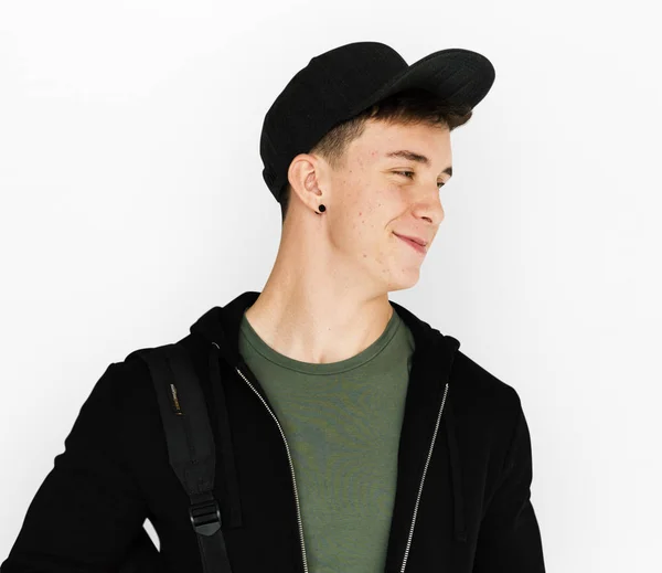 Smiling  teenager guy in the cap — Stock Photo, Image