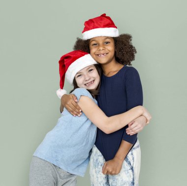 Noel Baba şapkaları küçük kız