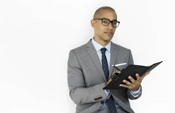 Business man writing in notebook — Stock Photo, Image