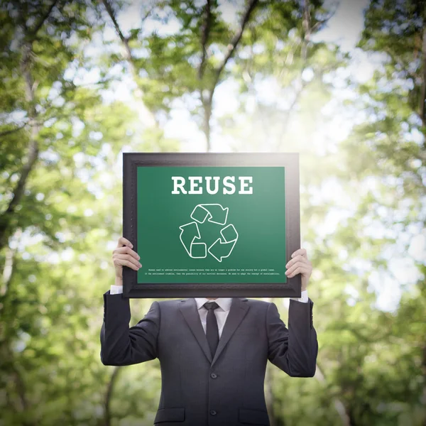 Geschäftsmann mit Plakat — Stockfoto