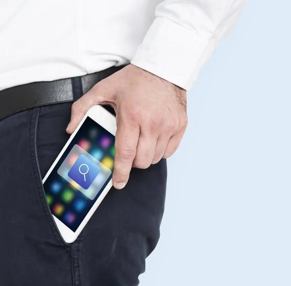 Man taking out smartphone from pocket — Stock Photo, Image