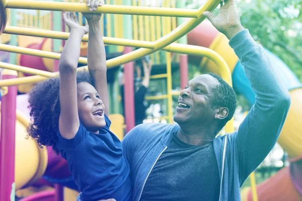 Family spending time at playground — Stock Photo, Image