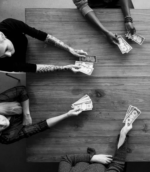 Hands holding dollar bills — Stock Photo, Image