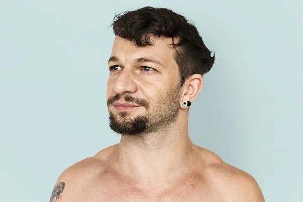 Giovane uomo con tatuaggio — Foto Stock