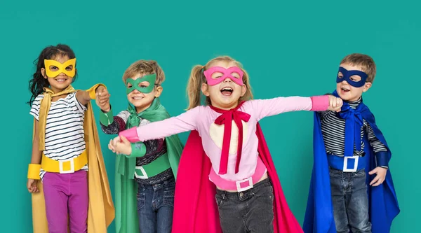 happy Kids in super heroe costumes