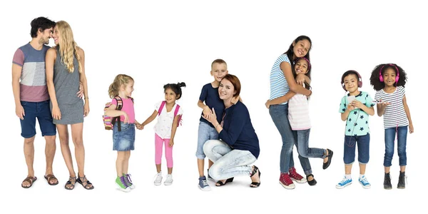 People and children standing in studio — Stock Photo, Image