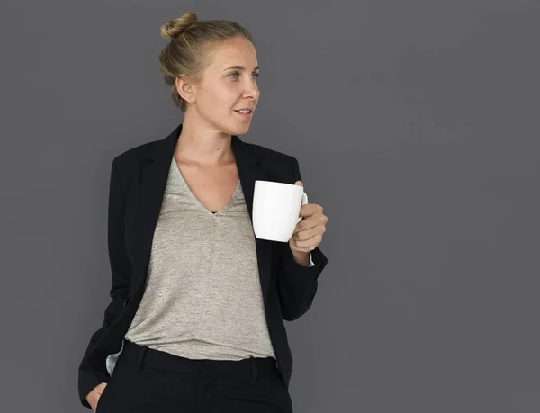 stock image business woman holding cup of coffee