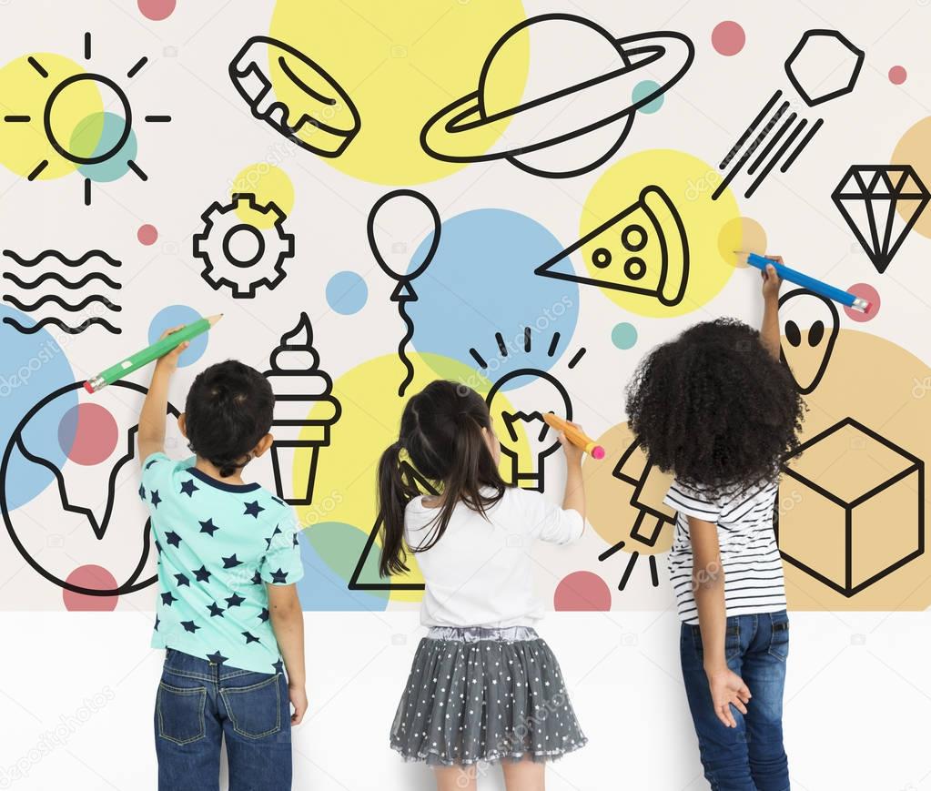 children drawing on wall