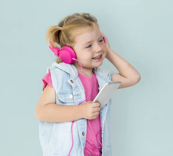 Menina com fones de ouvido — Fotografia de Stock