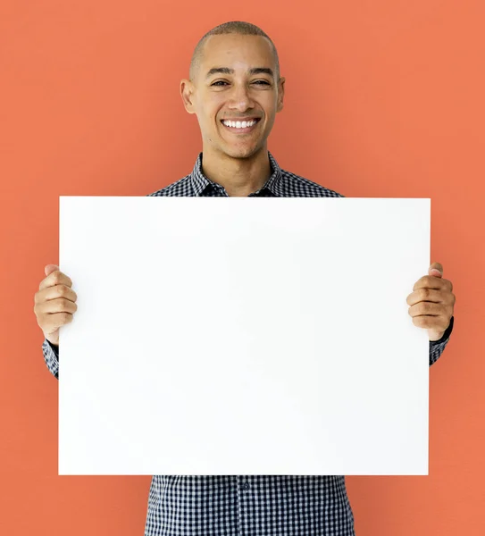 Man holding empty white placard — Stock Photo, Image