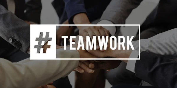 Hashtag teamwork with united hands of businesspeople — Stock Photo, Image