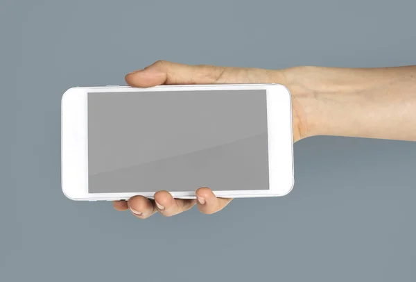 İnsan eli akıllı telefonu tutar — Stok fotoğraf