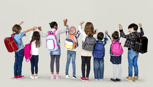 school children standing in a row 