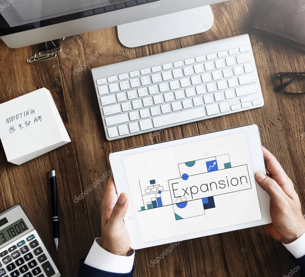 Businessman using digital tablet, Expansion Concept
