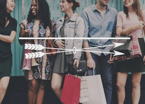 Multiethnic friends with shopping bags — Stock Photo, Image