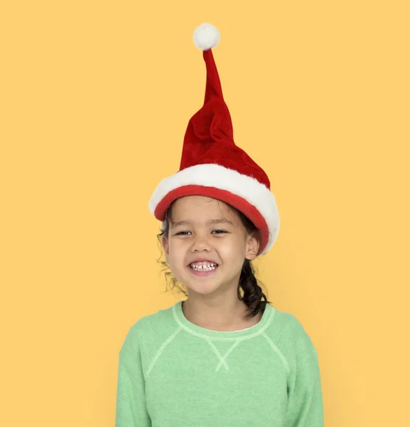 Rozkošný dívka v vánoční čepice — Stock fotografie
