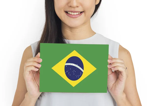 Young woman holding brazilian flag. — Stock Photo, Image